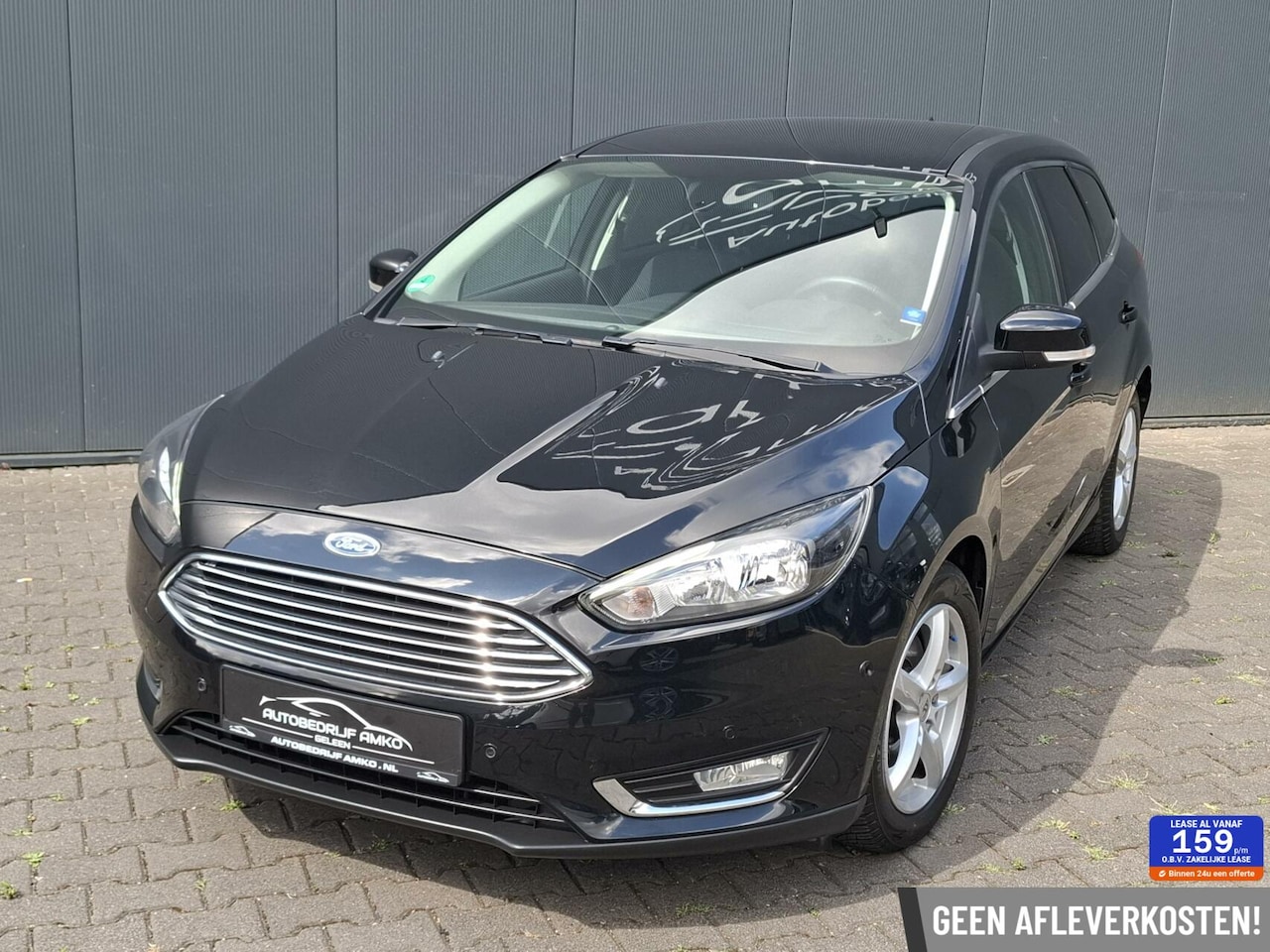Ford Focus Wagon - 1.5 Titanium Edition / CRUISE. / NAVI / ENZ. - AutoWereld.nl