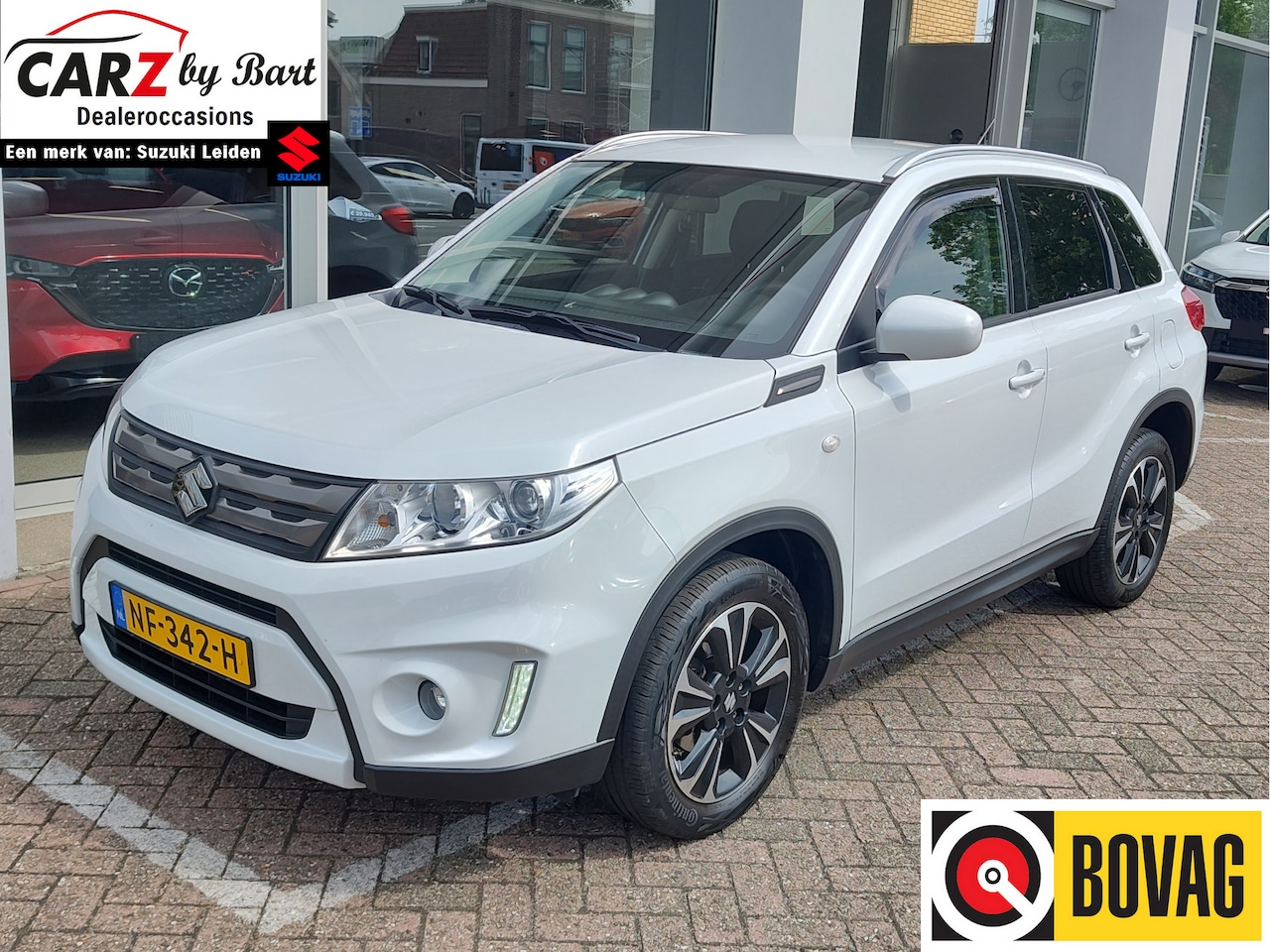 Suzuki Vitara - 1.6 EXCLUSIVE AUTOMAAT Navi | Camera | Cruise | Stoelverwarming - AutoWereld.nl