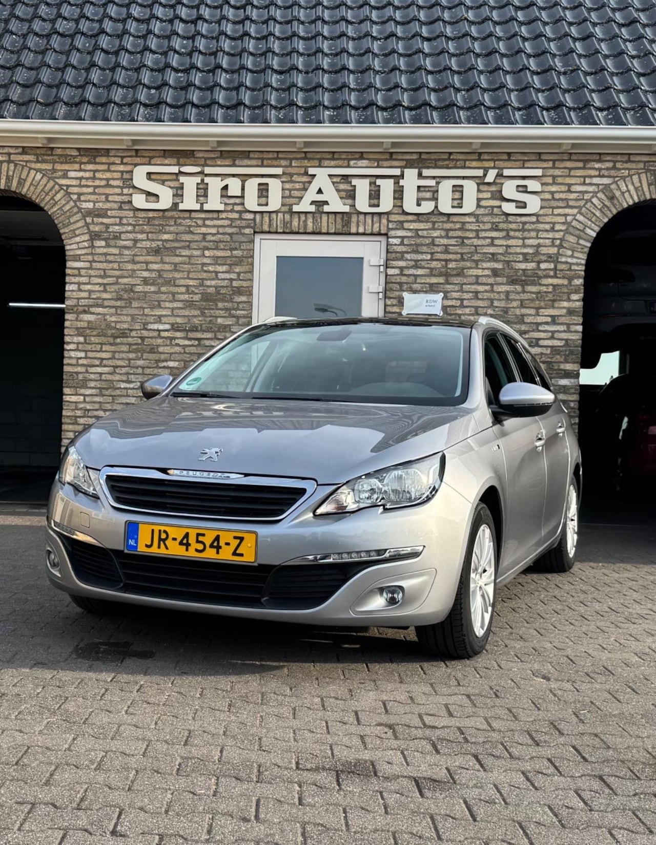 Peugeot 308 SW - 1.2 PureTech Style Bj 2016 met slechts 87999 km - AutoWereld.nl