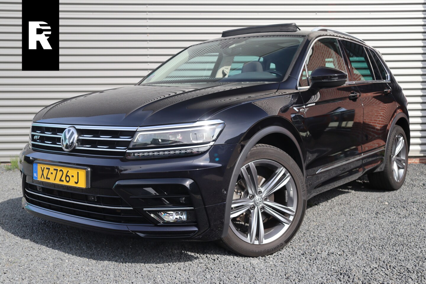 Volkswagen Tiguan - 1.5 TSI R-Line Highline Panorama / Camera / Digital dash / Adaptieve cruise / 19inch - AutoWereld.nl