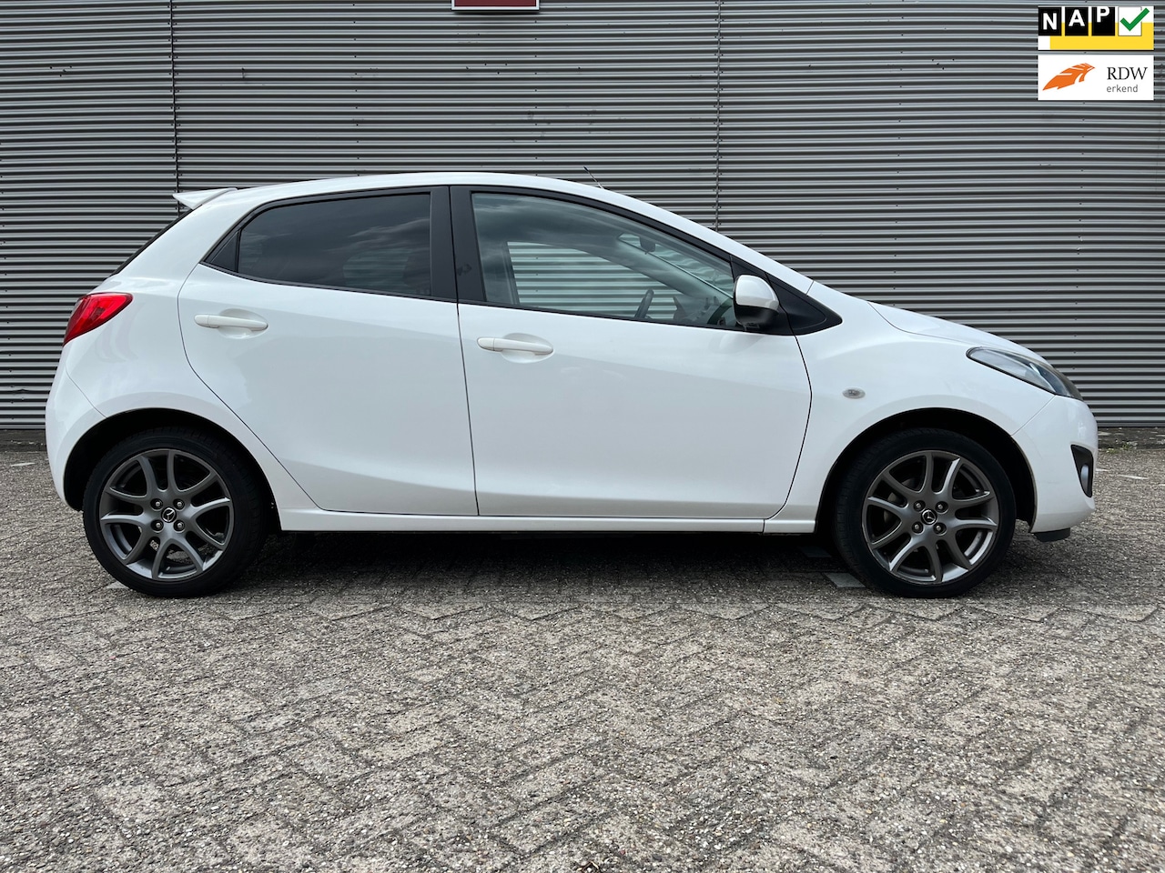 Mazda 2 - 1.3 Navigator GT 5drs Airco - 1e eigenaar - sensoren - aux - stoelverwarming - lm velgen - - AutoWereld.nl