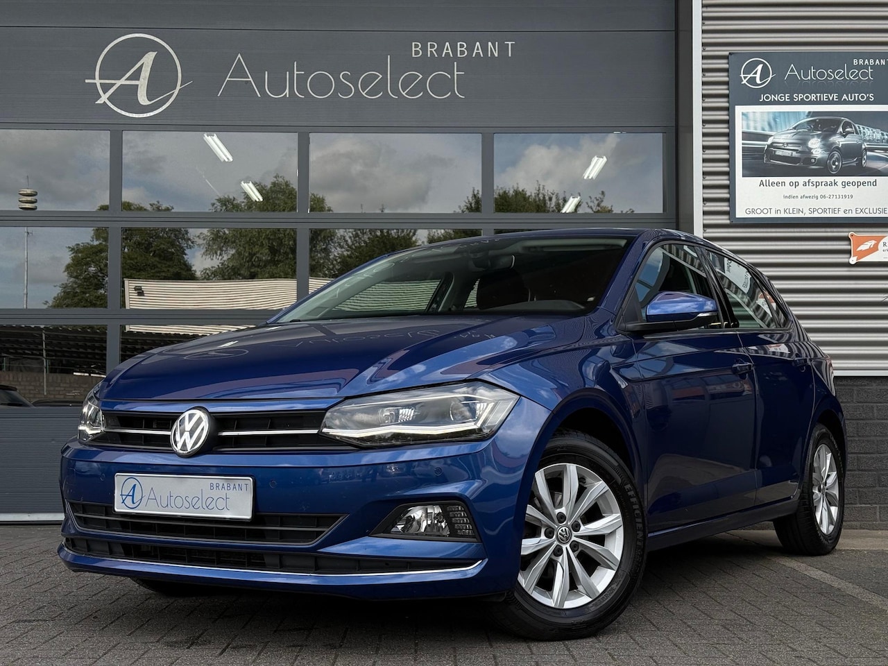 Volkswagen Polo - 1.0 TSI Highline DSG LED Navi PDC - AutoWereld.nl