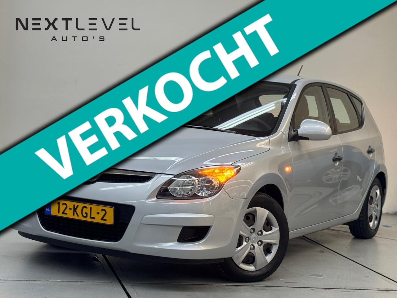 Hyundai i30 - 1.4i Blue Active Cool Airco Nieuwe Apk - AutoWereld.nl