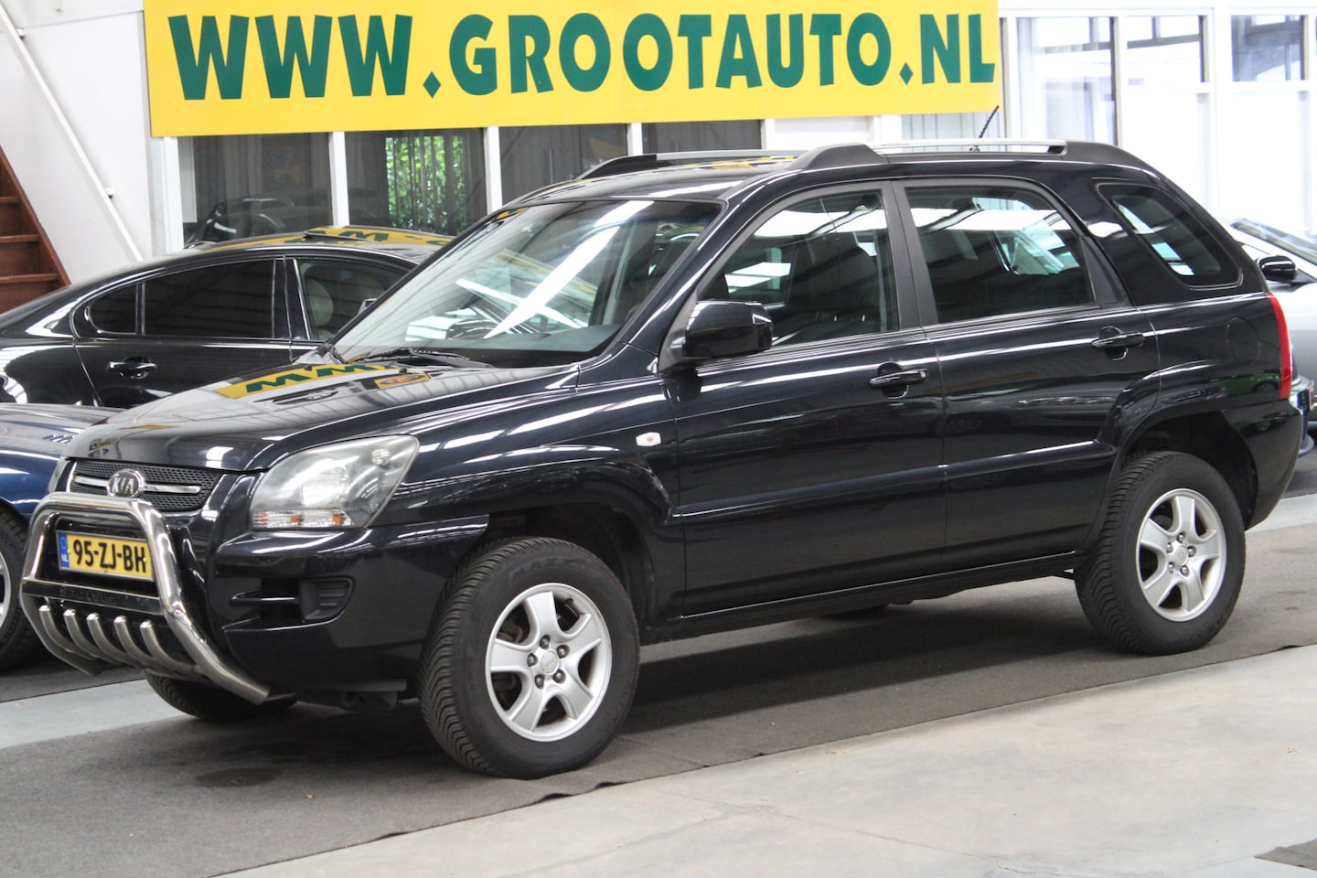 Kia Sportage - 2.0 CVVT X-pect NAP, Airco, Trekhaak, Stuurbekrachtiging - AutoWereld.nl