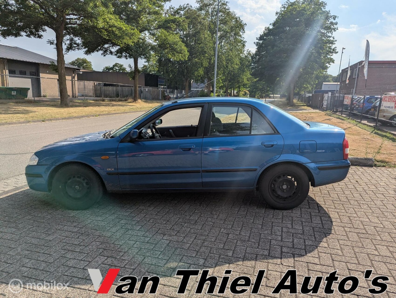 Mazda 323 - 1.5i GLX ijskoude airco sedan el.ramen - AutoWereld.nl