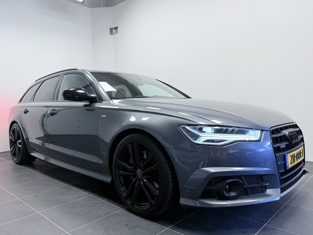 Audi A6 Avant - 2.0 TFSI quattro 252pk S-Line/Panodak/Supersport stoelen/Bose/Trekhaak - AutoWereld.nl
