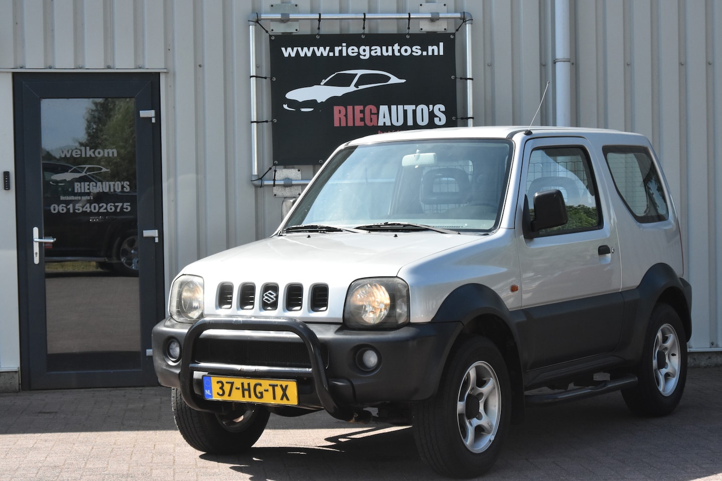 Suzuki Jimny - 1.3 JX 2WD Trekhaak, 5-Bak B.J. 2001 - AutoWereld.nl
