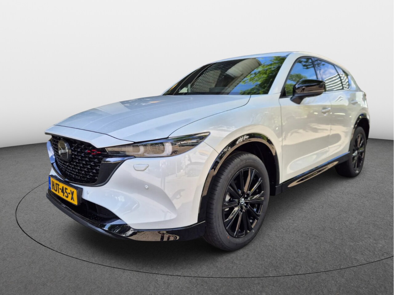Mazda CX-5 - e-Skyactiv-G 165 Homura - Comfort Pack & Sunroof Pack | 19-inch lichtmetalen velgen, Black - AutoWereld.nl