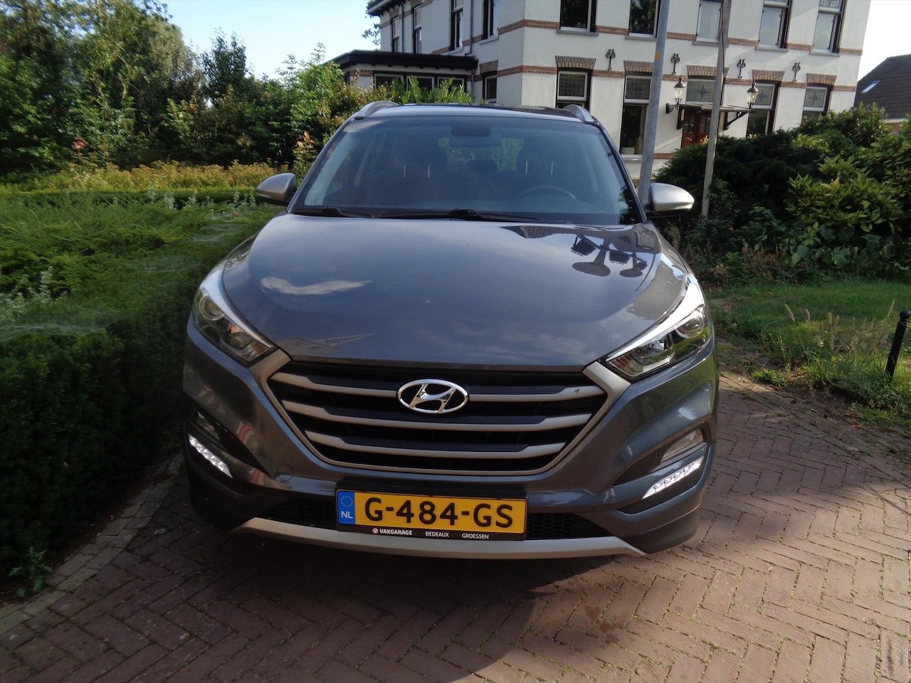 Hyundai Tucson - 1.6 GDi 132pk Comfort bij Vakgarage® prijs rijklaar, met 12 maanden Bovag garantie. - AutoWereld.nl