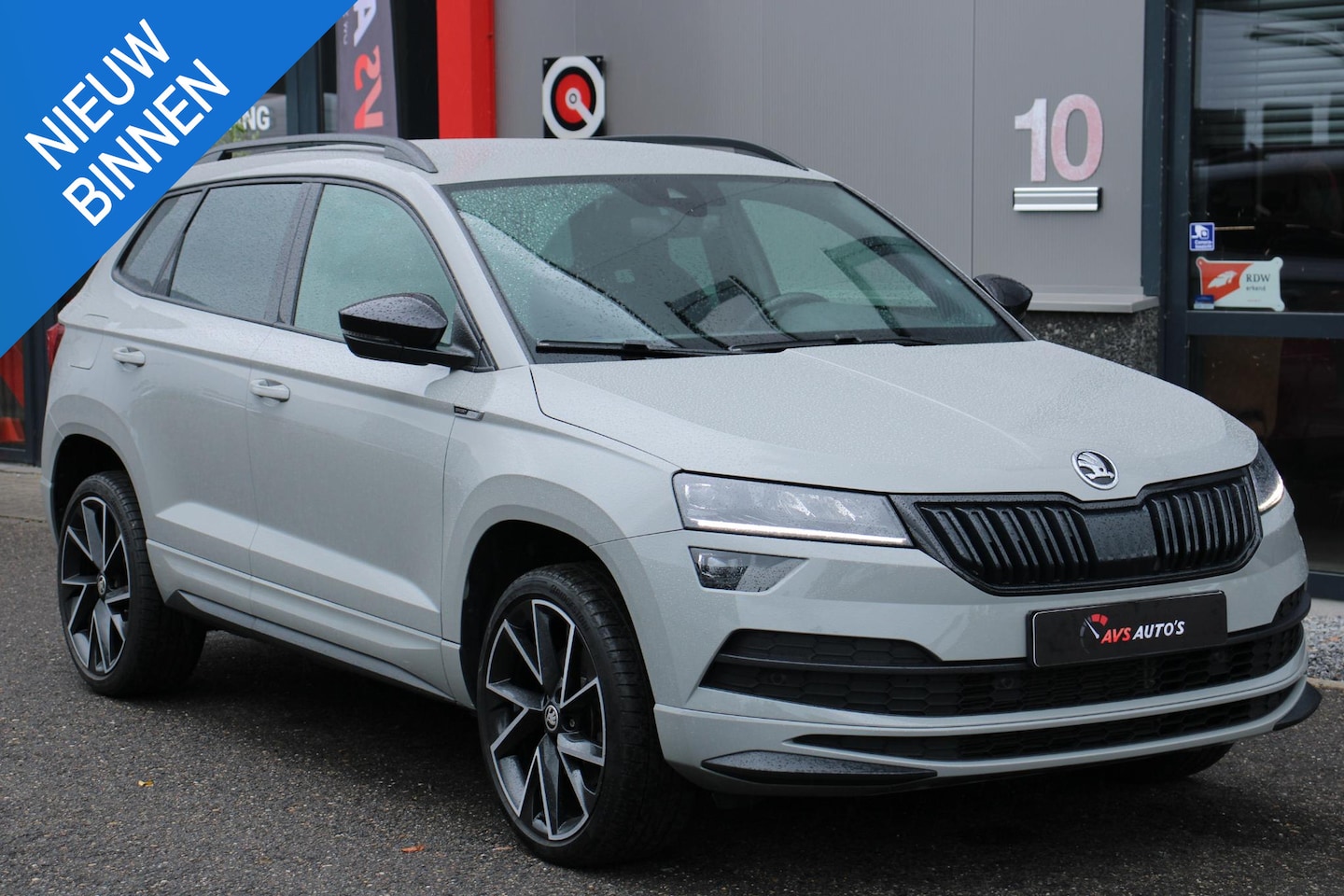 Skoda Karoq - 1.5 TSI ACT Sportline Business 54DKM, VIRTUAL, DSG, 19INCH, STOELVERWARMING - AutoWereld.nl