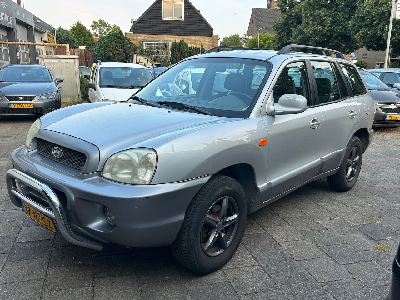 Hyundai Santa Fe - 2.0i-16V Motion 2004 trekhaak! cruise control! airco! hoge instap! - AutoWereld.nl