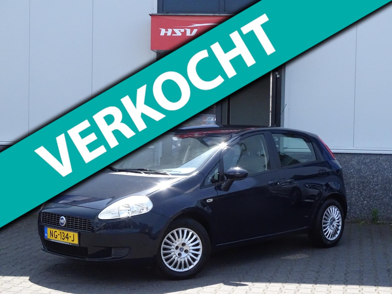 Fiat Grande Punto - 1.2 Active airco 4-deurs 1e eigenaar - AutoWereld.nl