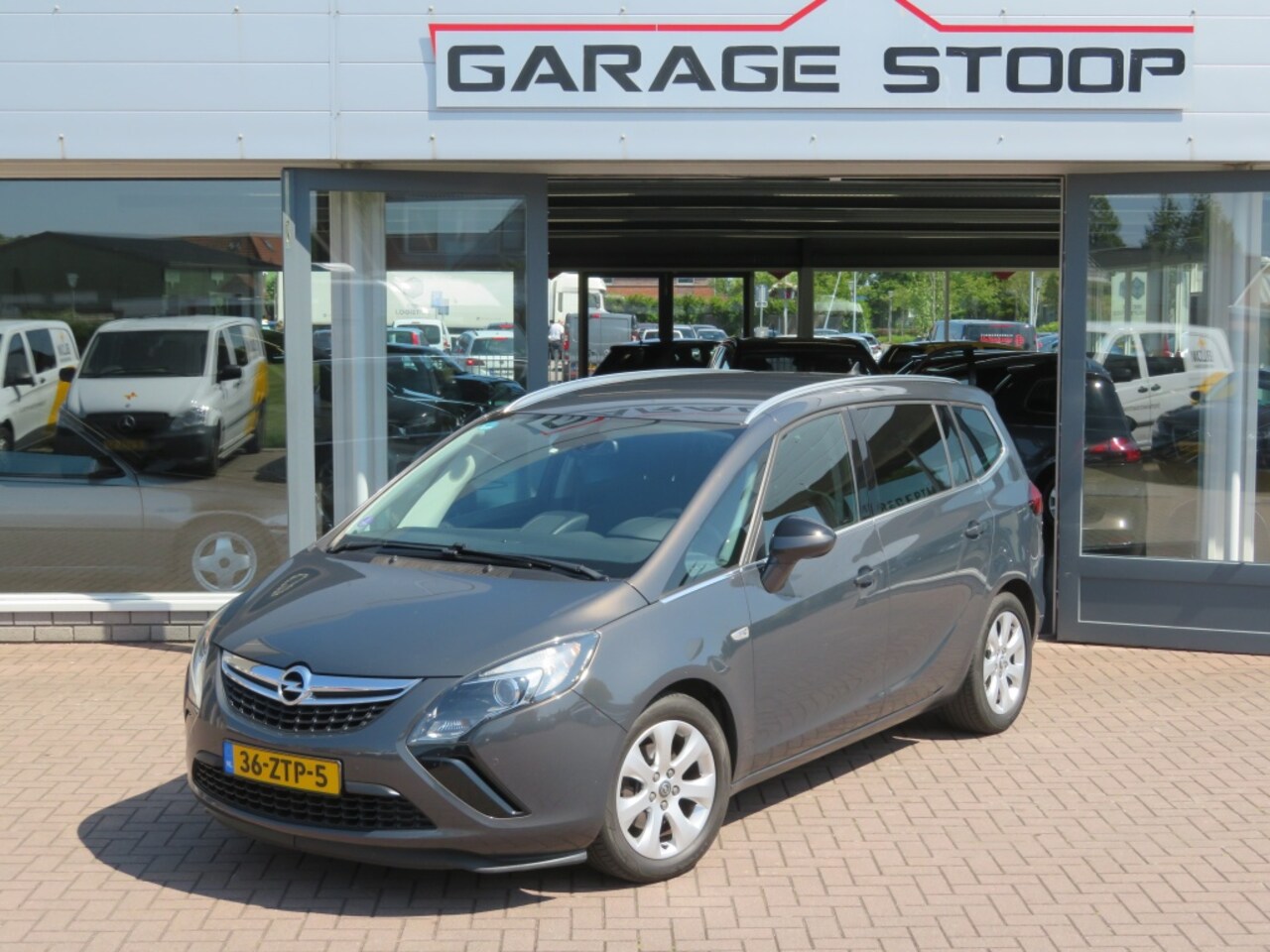 Opel Zafira Tourer - 1.4 Rhythm 120pk met airco en Navigatie - AutoWereld.nl