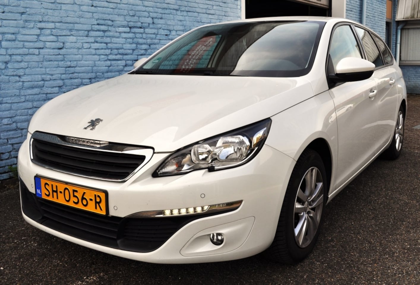 Peugeot 308 SW - 1.2 Style Navi pdc v+a cam - AutoWereld.nl