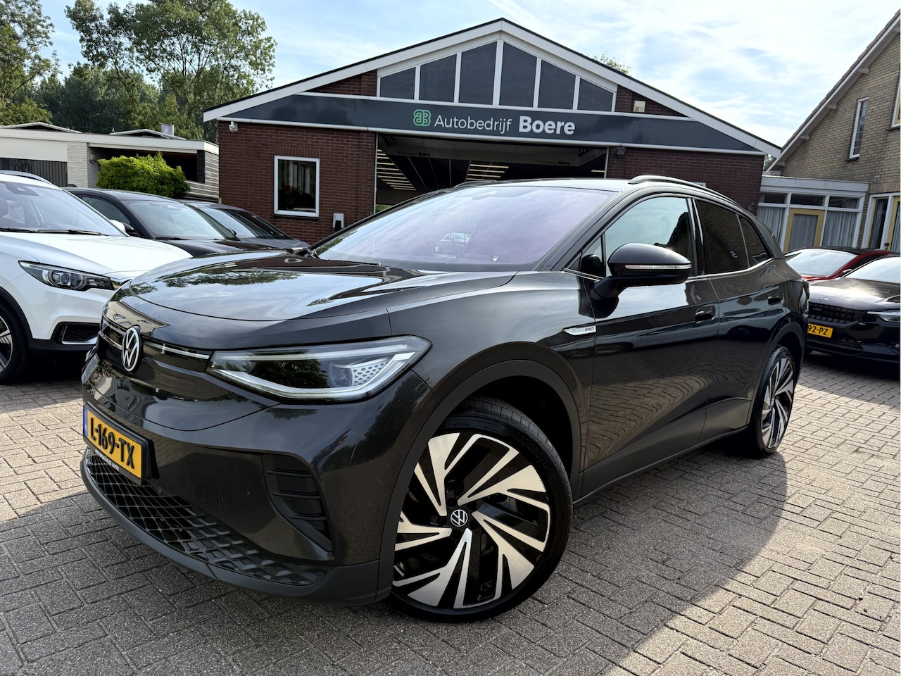 Volkswagen ID.4 - Business 77 kWh Trekhaak, 21''Lmv, Camera - AutoWereld.nl