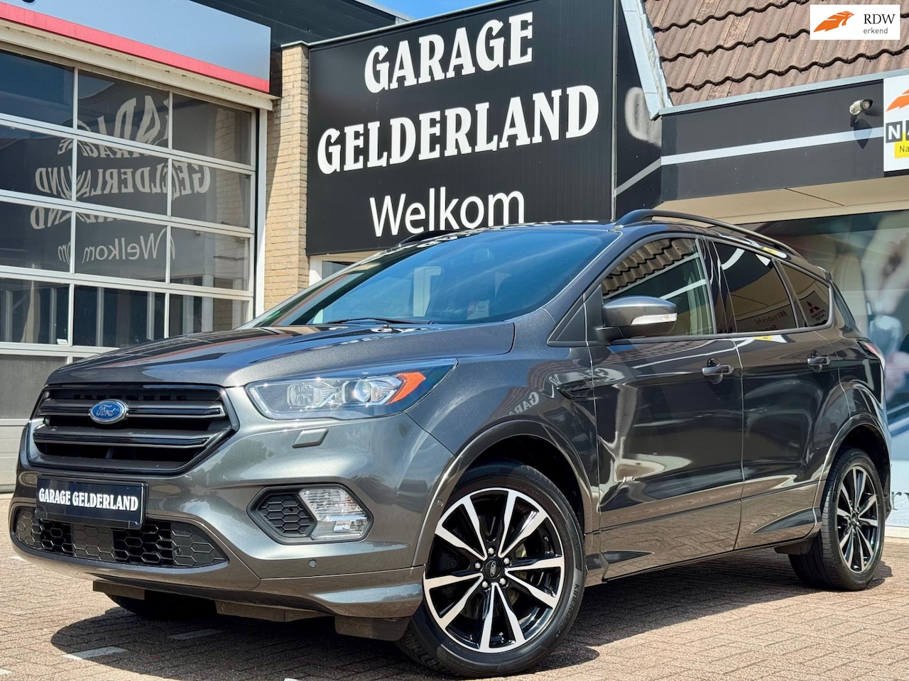 Ford Kuga - 1.5 182pk ST Line | Bi-Xenon | Full-Led | Android | Alcantara/Leder | Cruise | Climate | I - AutoWereld.nl