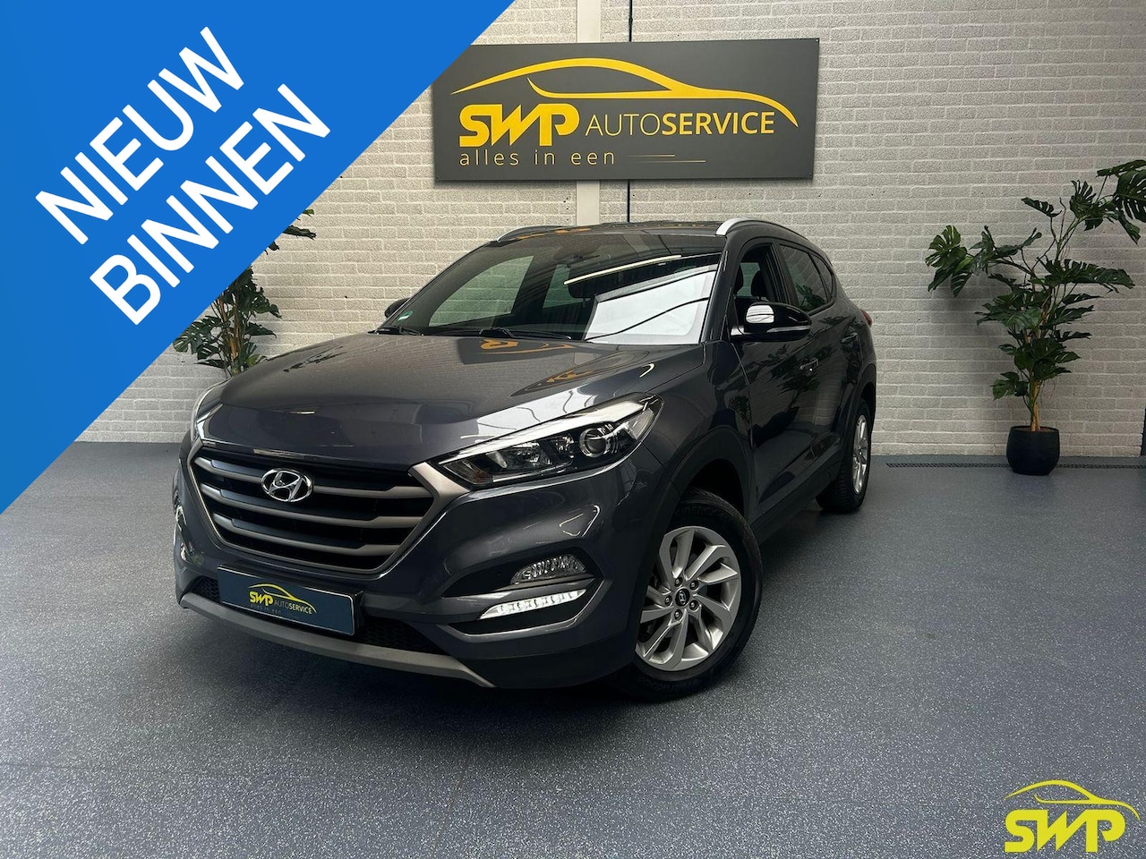 Hyundai Tucson - 1.6 GDI Comfort | Navi | Camera | Climate | Stoelverwarming | Stuurverwarming - AutoWereld.nl