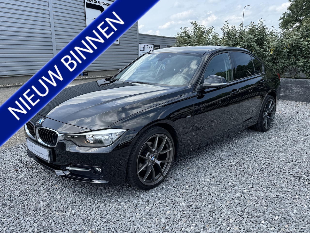 BMW 3-serie - 316i Aut. Sportline Navi|Cruis|PDC|Stoelverw Zwart - AutoWereld.nl