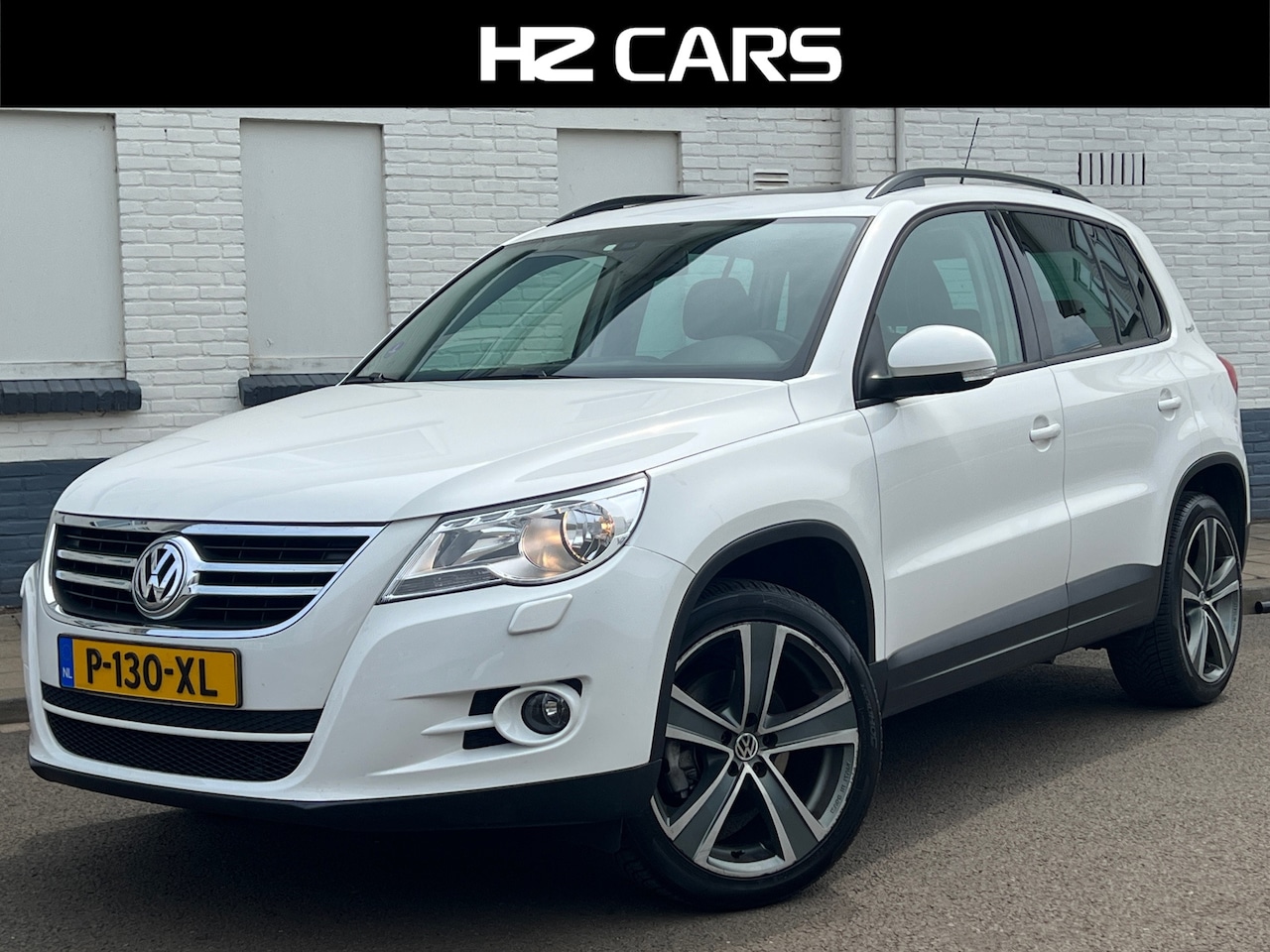 Volkswagen Tiguan - 1.4 TSI Sport&Style|Panodak|PDC|Clima|Cruise - AutoWereld.nl