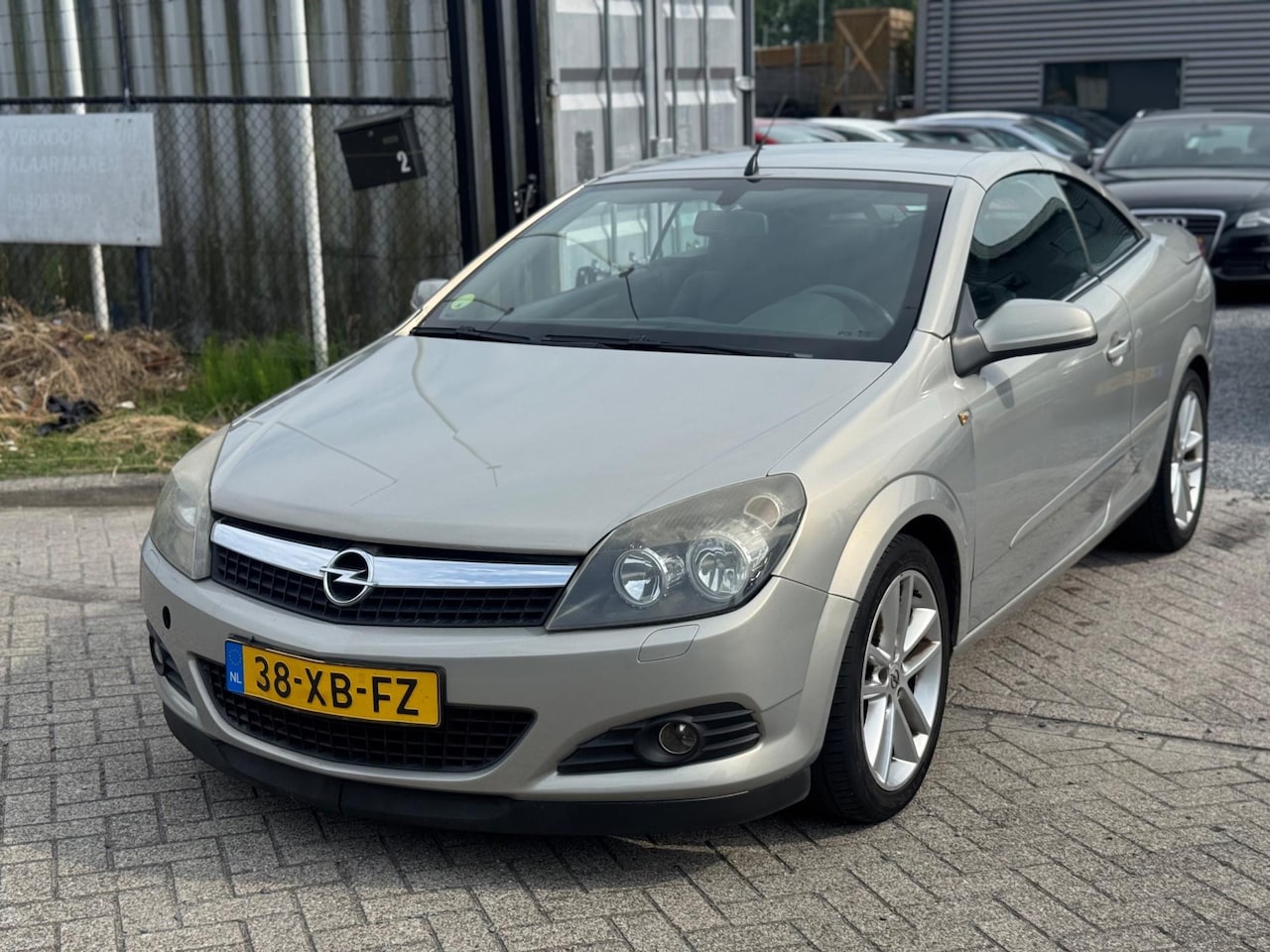 Opel Astra TwinTop - 1.6 Enjoy Cabrio Airco Navi inruil koopje - AutoWereld.nl