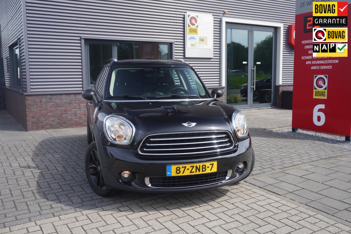 MINI Countryman - Mini 1.6 One Edition / Navigatie / Airco - AutoWereld.nl