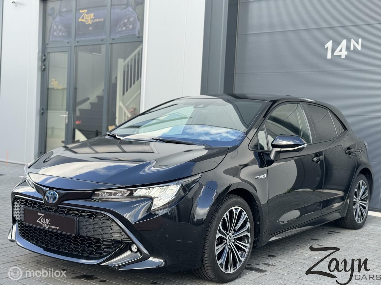 Toyota Corolla - 1.8 Hybrid Business | NAP | LED | 17" LM | - AutoWereld.nl
