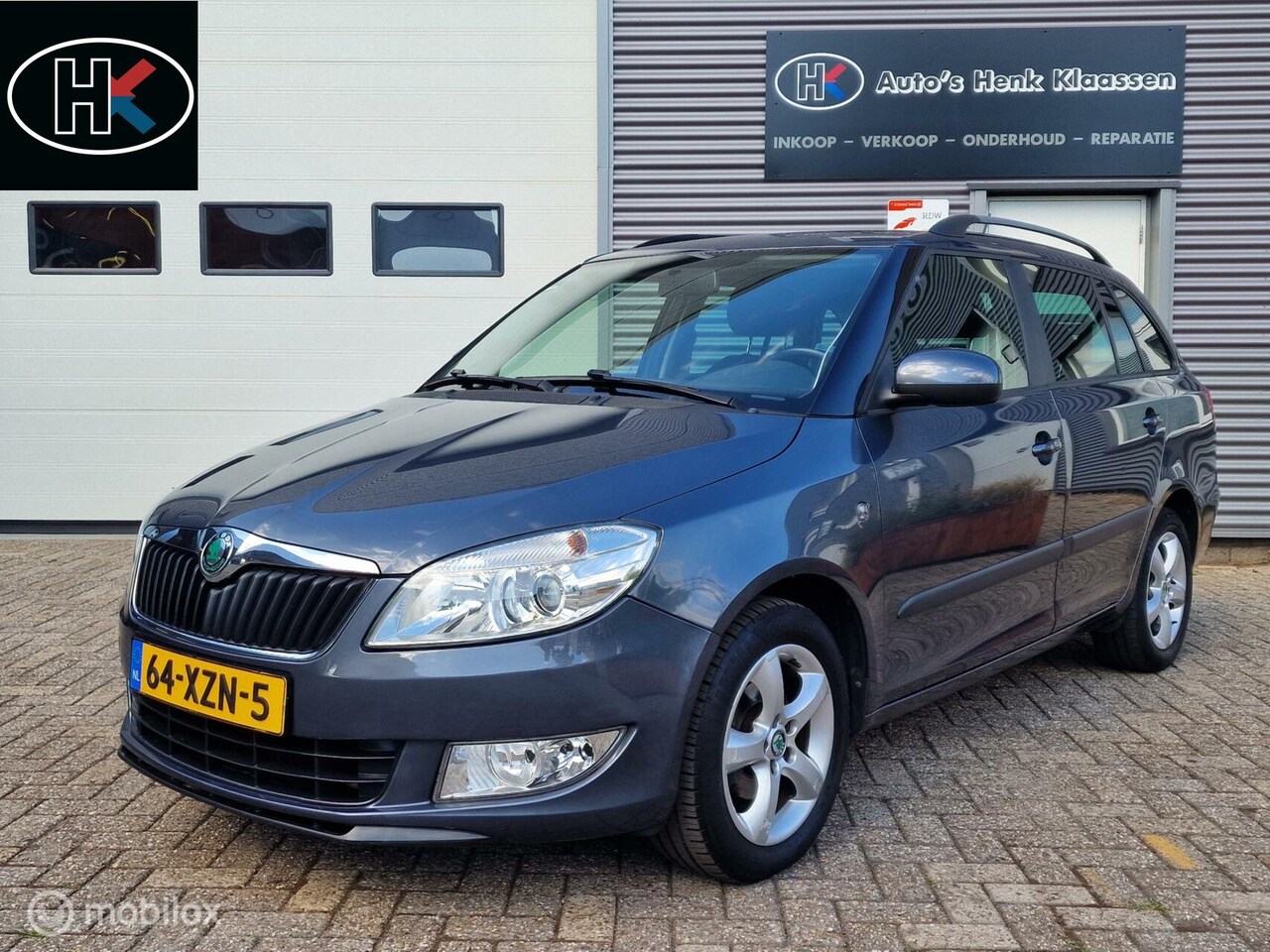 Skoda Fabia Combi - 1.2TSi Airco LM elRam CDVab Navi CruiseCon - AutoWereld.nl