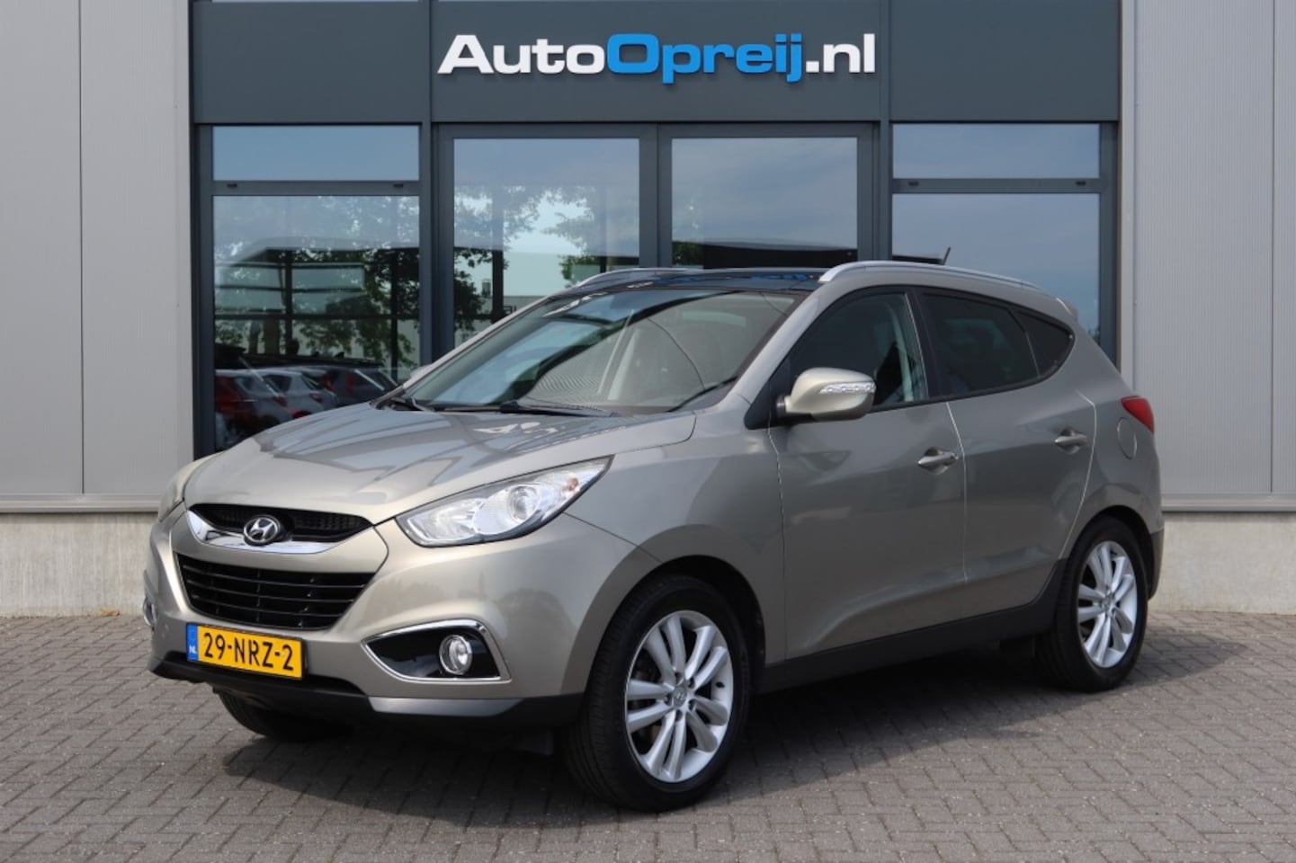 Hyundai ix35 - 2.0i i-Catcher NAVI, Camera, Schuif/kanteldak, Trekhaak, Leer, 1e eigenaar - AutoWereld.nl