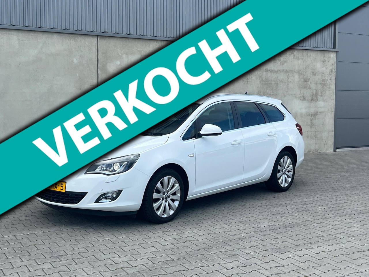 Opel Astra Sports Tourer - 1.4 Turbo Cosmo AUTOMAAT+NAVIGATIE+HALF LEDER+CRUISE+PDC+TREKHAAK+APK 06-04-2026+2 SLEUTEL - AutoWereld.nl