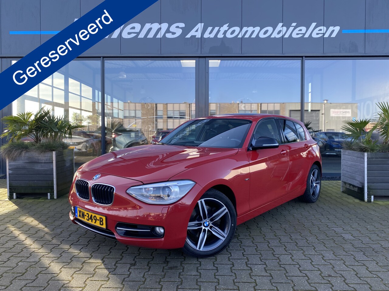 BMW 1-serie - 118i High Executive M-PAKKET Navigatie, Climate Control & Schuifkanteldak - AutoWereld.nl