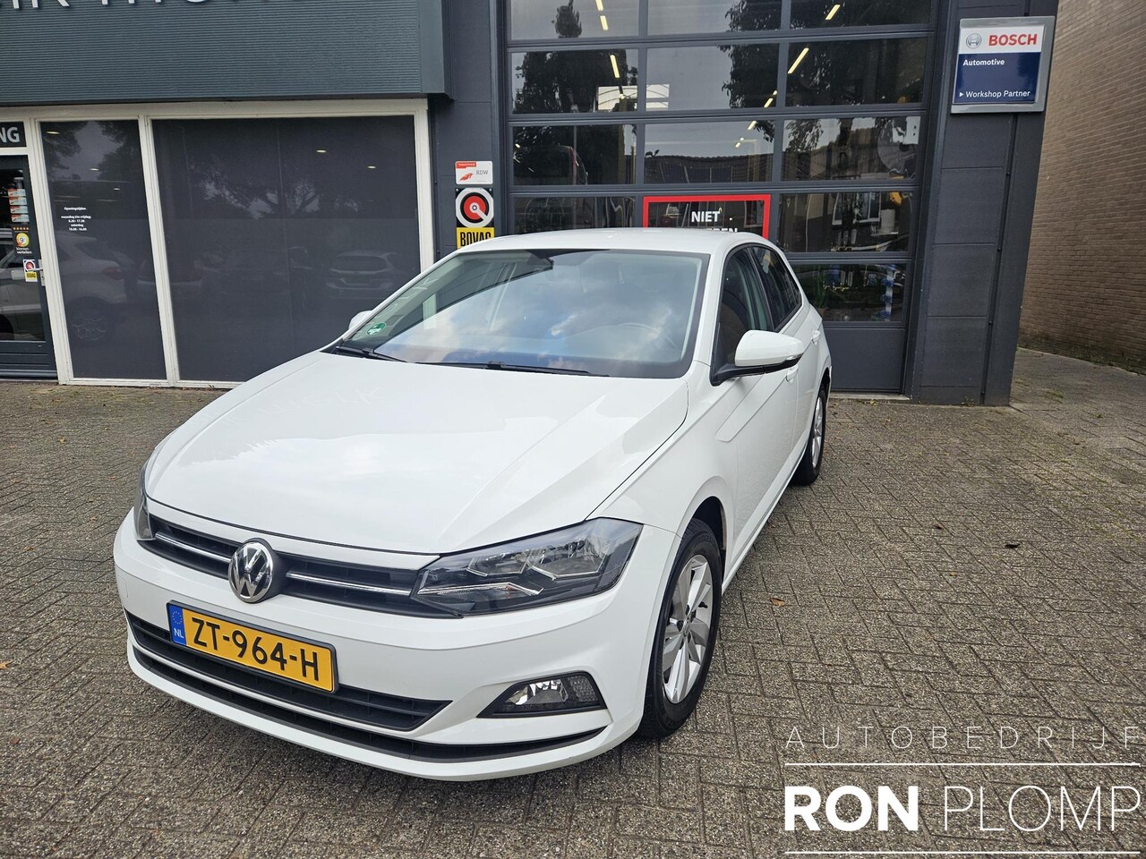 Volkswagen Polo - 1.0 TSI Comfortline / Airco clima/ Navigatie/ Cruise/ PDC/ LMV - AutoWereld.nl