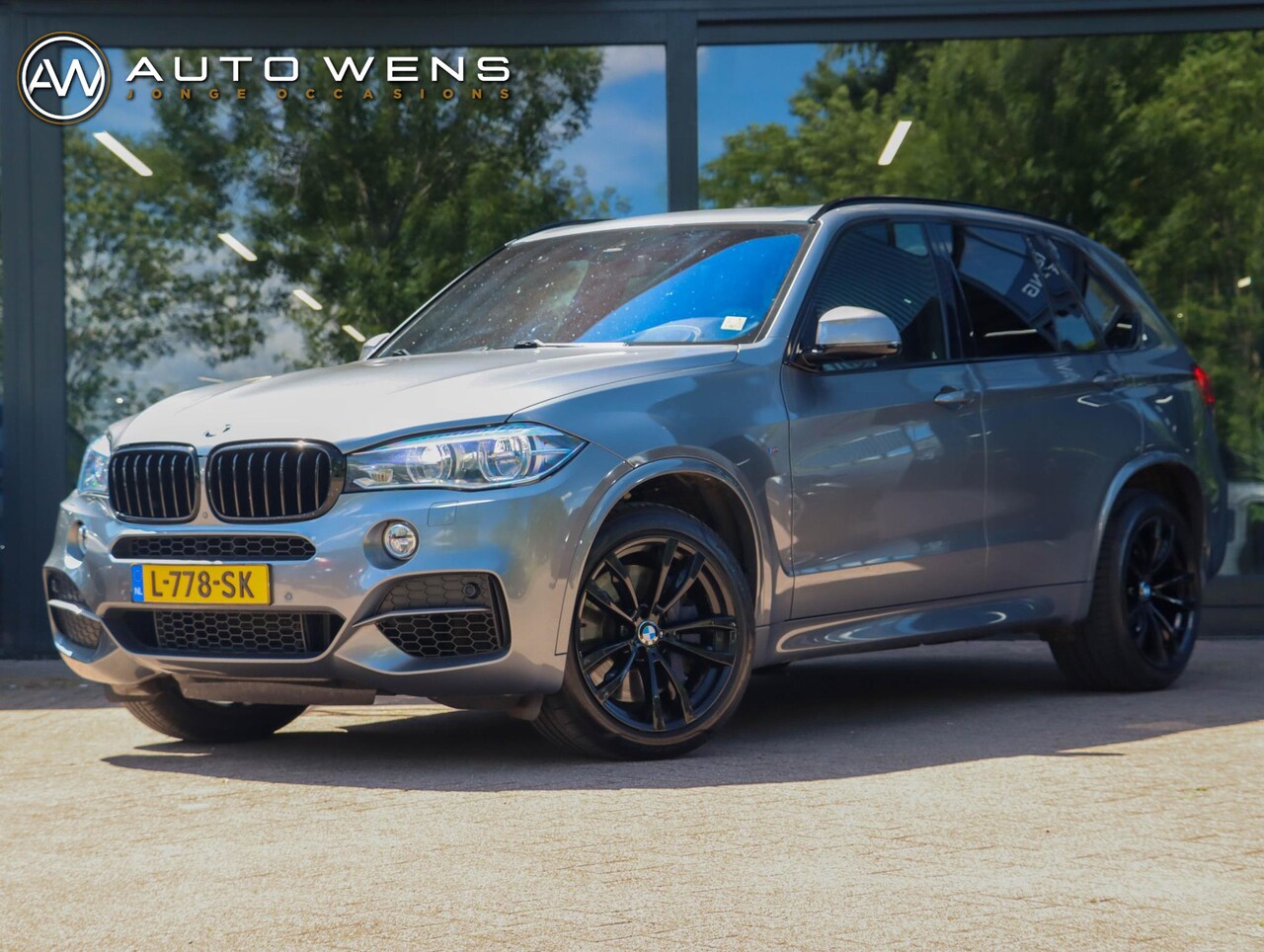 BMW X5 - M50d 381PK | Trekhaak | Panodak | Harman Kardon | Zeer goed onderhouden! - AutoWereld.nl