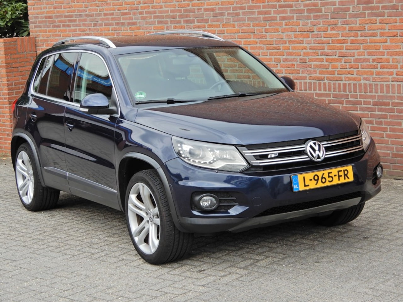 Volkswagen Tiguan - 2.0 TSI SPORTenSTYLE 4MOTION  automaat - AutoWereld.nl