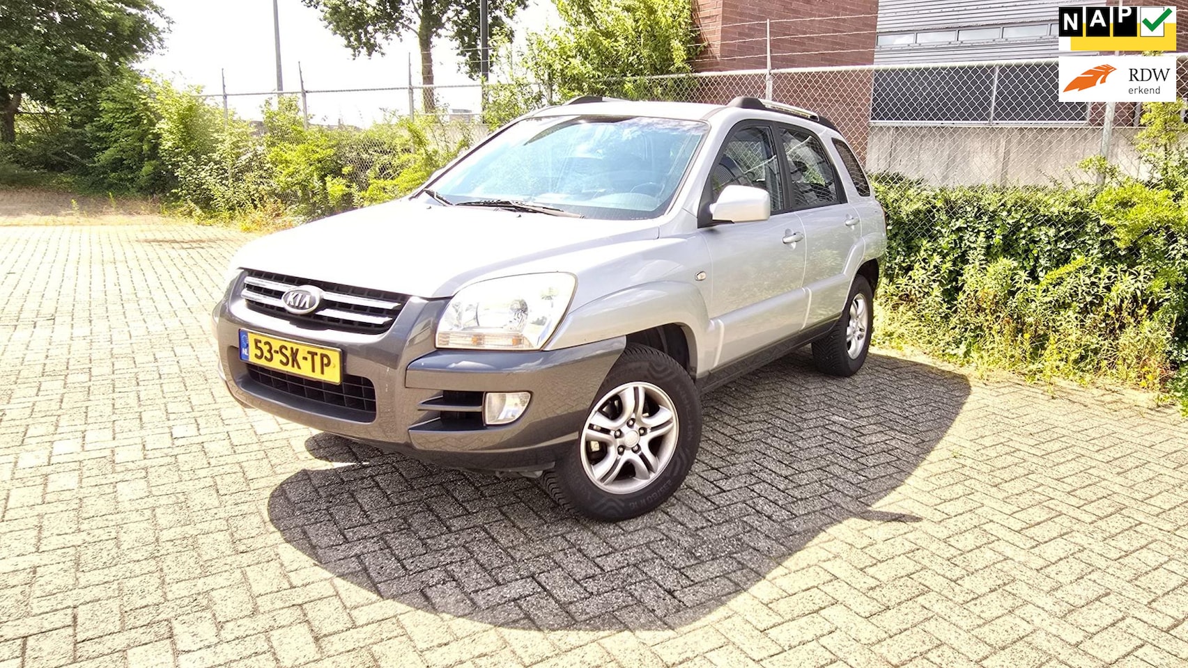 Kia Sportage - 2.0 CVVT Executive 2.0 CVVT Executive - AutoWereld.nl
