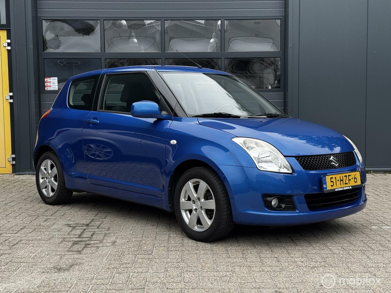 Suzuki Swift - 1.3, Airco, trekhaak, multifunctioneel stuur - AutoWereld.nl