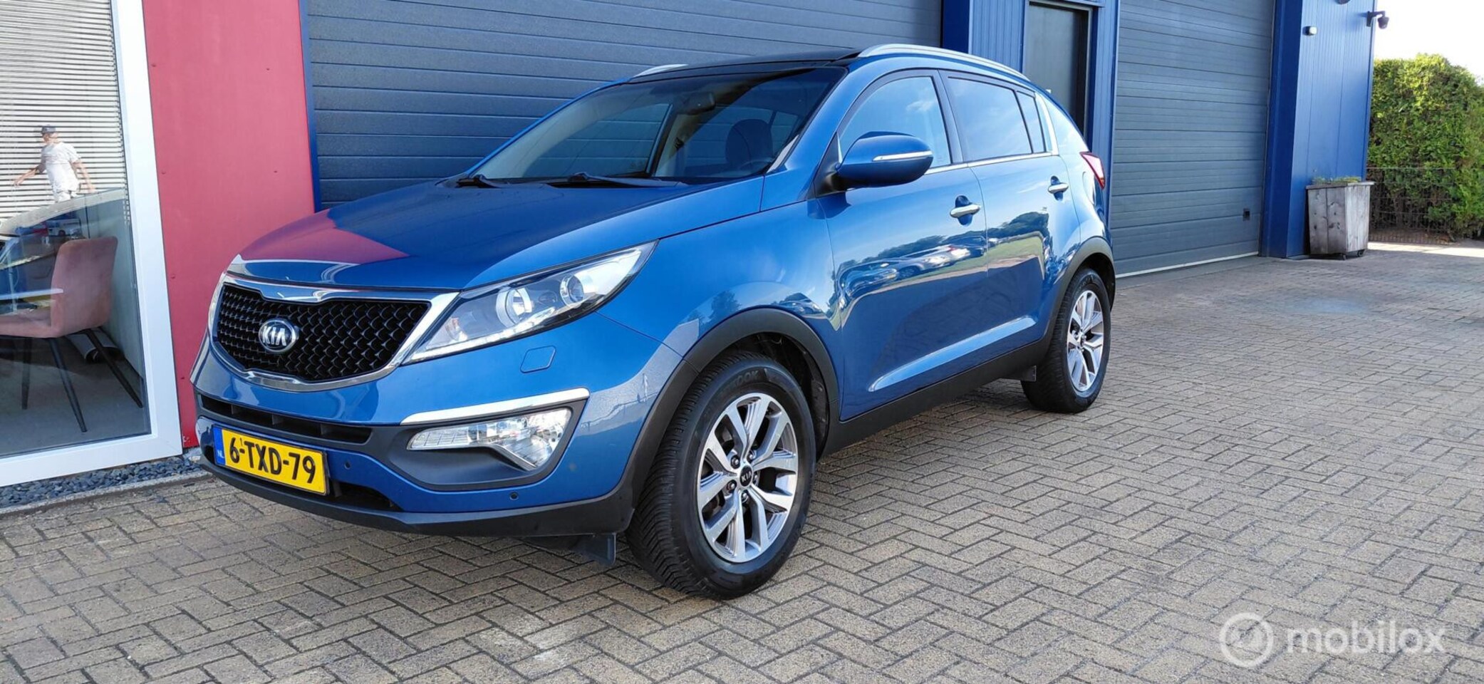 Kia Sportage - 1.6 GDI 1.6 GDI,navi,Trekhaak,Pano,Leer - AutoWereld.nl