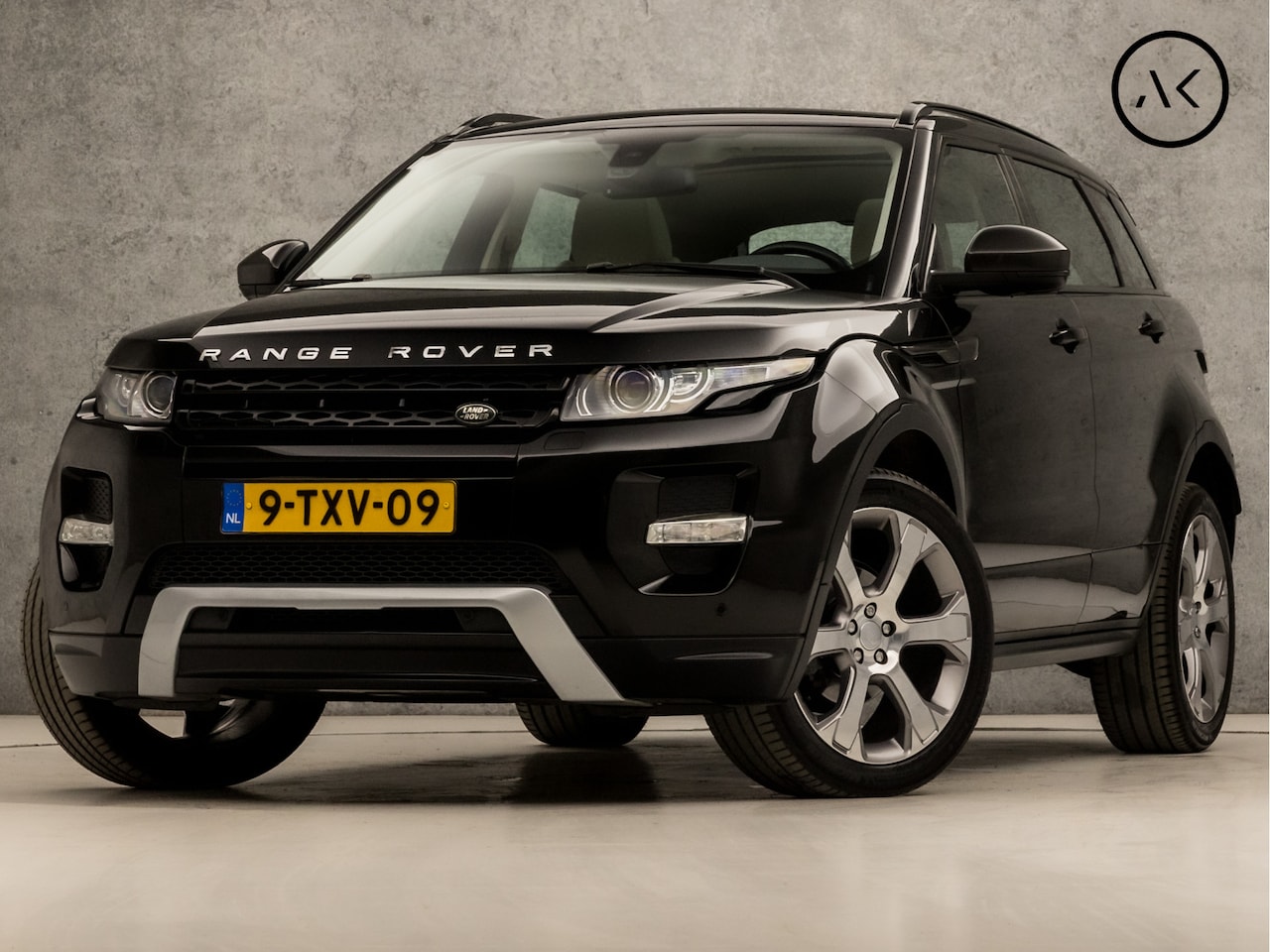 Land Rover Range Rover Evoque - 2.0 Si 4WD Sicilian Yellow 241Pk Automaat (PANORAMADAK, NAVIGATIE, MEMORY SEATS, STOELKOEL - AutoWereld.nl