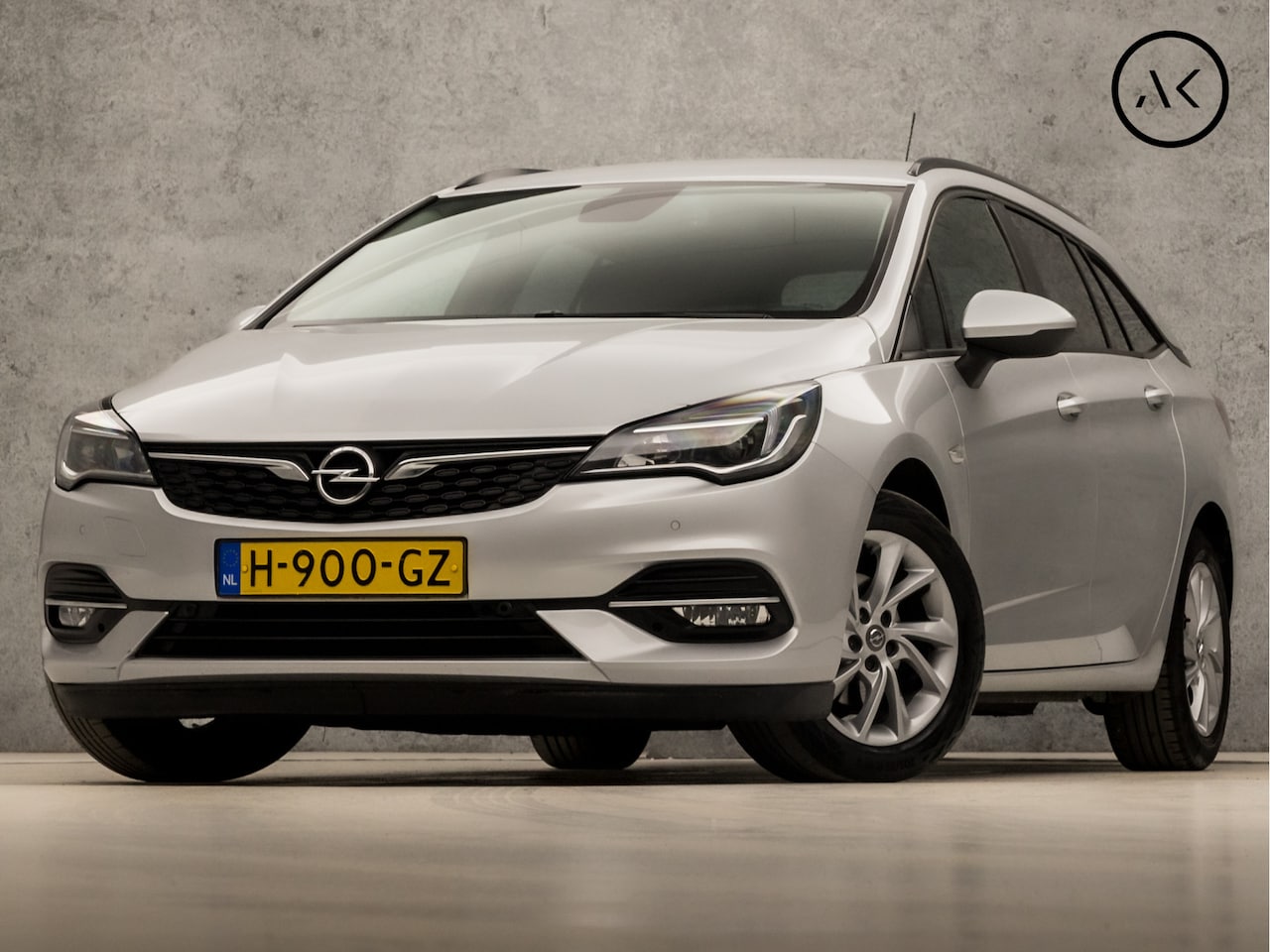 Opel Astra Sports Tourer - 1.4 Sport 146Pk Automaat (APPLE CARPLAY, NAVIGATIE, CAMERA, CLIMATE, GETINT GLAS, SPORTSTO - AutoWereld.nl