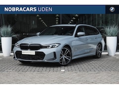 BMW 3-serie Touring - 318i High Executive M Sport Automaat / Panoramadak / Trekhaak / Sportstoelen / Stoelverwar