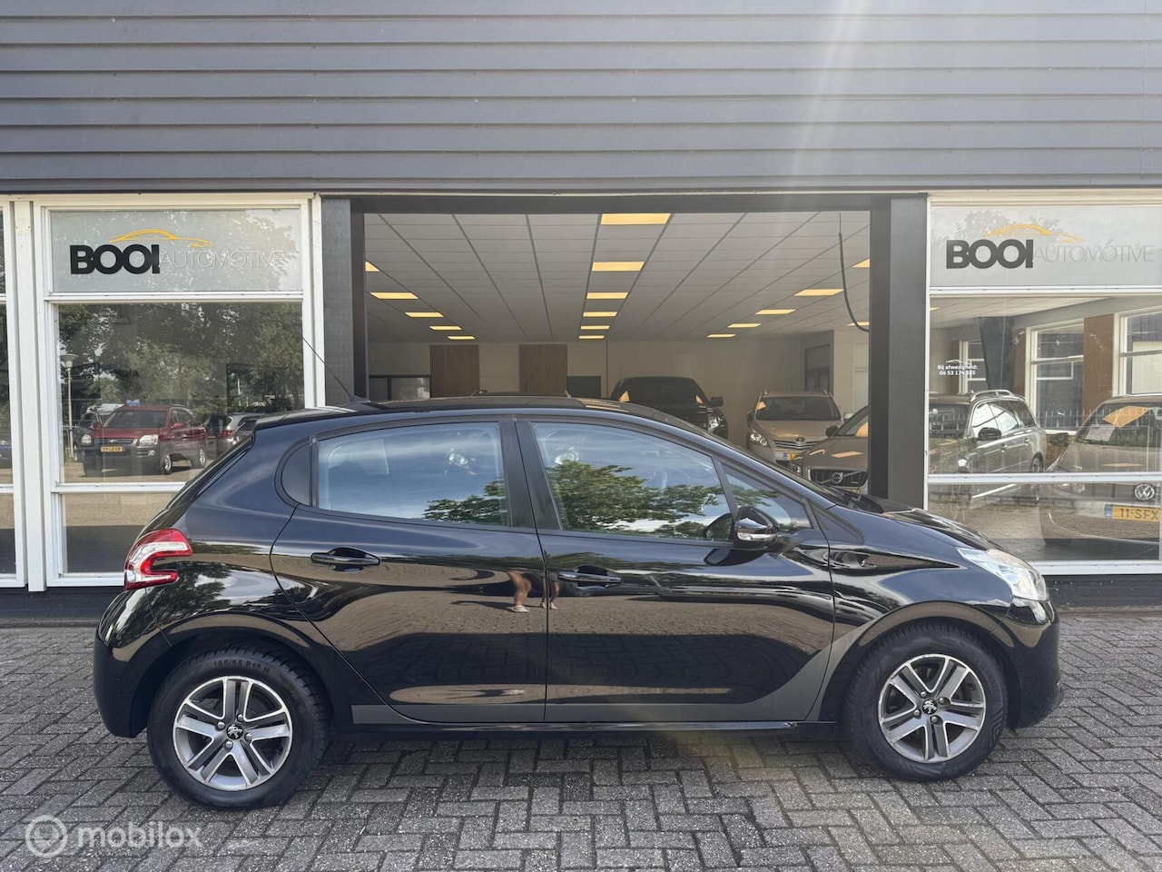 Peugeot 208 - 1.2 VTi Envy Eerste eigenaar CLIMA NAVI PDC - AutoWereld.nl