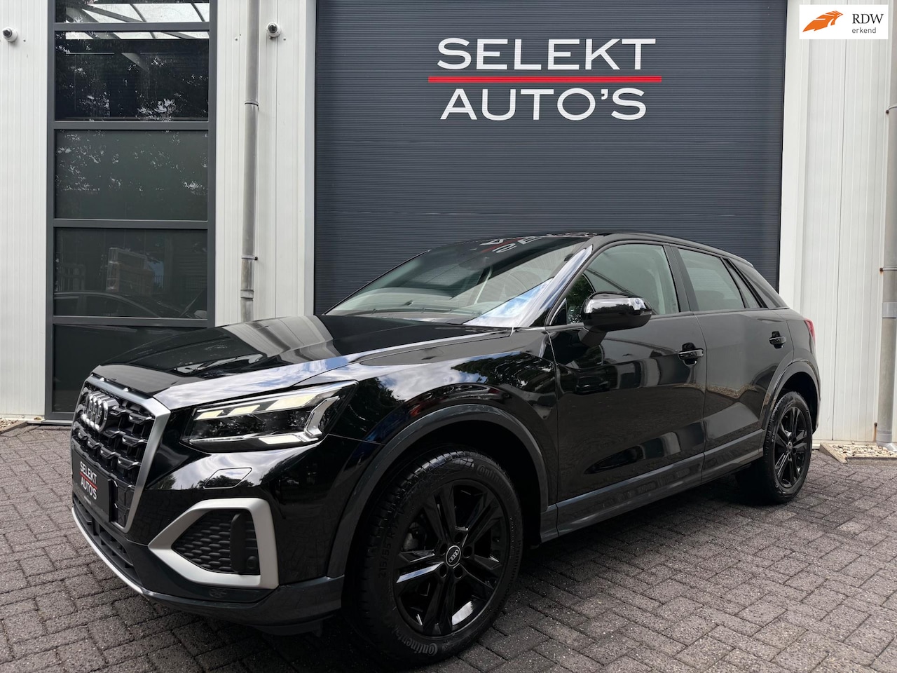 Audi Q2 - 35 TFSI Business Edition Automaat/LED/Climate/Cruise/Trekhaak/Stoelverwarming/Car Play/Key - AutoWereld.nl