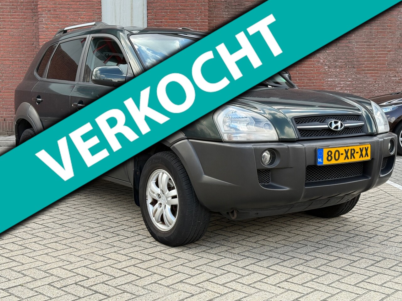 Hyundai Tucson - 2.0i Style Premium|LEDER|CLIMA|TREKHAAK|PDC| - AutoWereld.nl