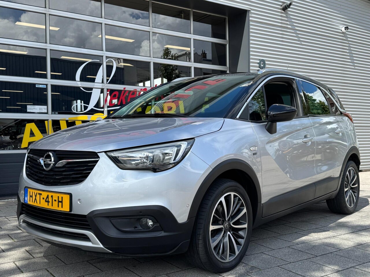 Opel Crossland X - 1.2 Turbo 120 Jaar Edition - Navigatie / Apple CarPlay I Airco I LED I PDC I Sport velgen - AutoWereld.nl