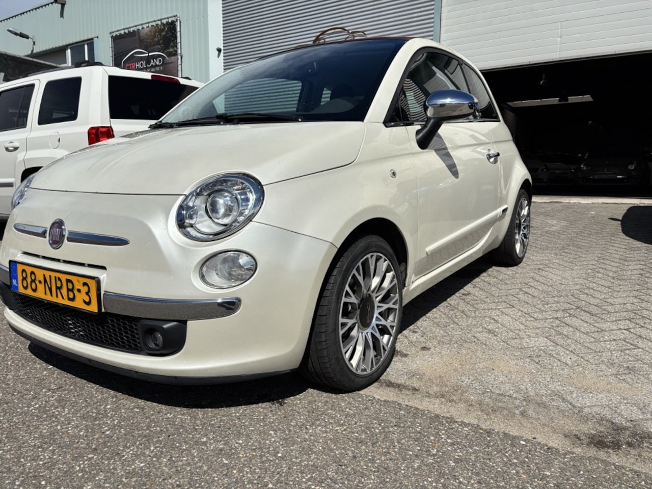 Fiat 500 C - 1.2 Rock 1e Eign. Nl auto Parelmoer nette auto - AutoWereld.nl
