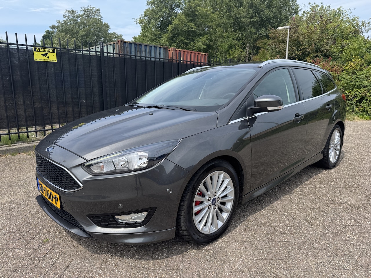 Ford Focus Wagon - 1.0 Titanium Edition Navi/Clima/Cruise/PDC/LMV - AutoWereld.nl