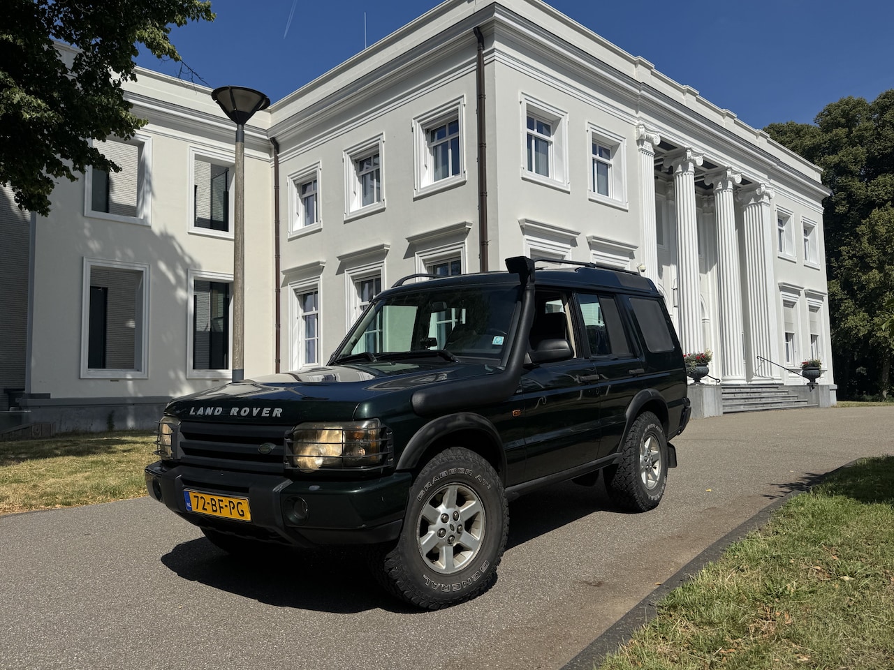 Land Rover Discovery - 2.5 Td5 E AUT VAN, HALFLEDER - AutoWereld.nl