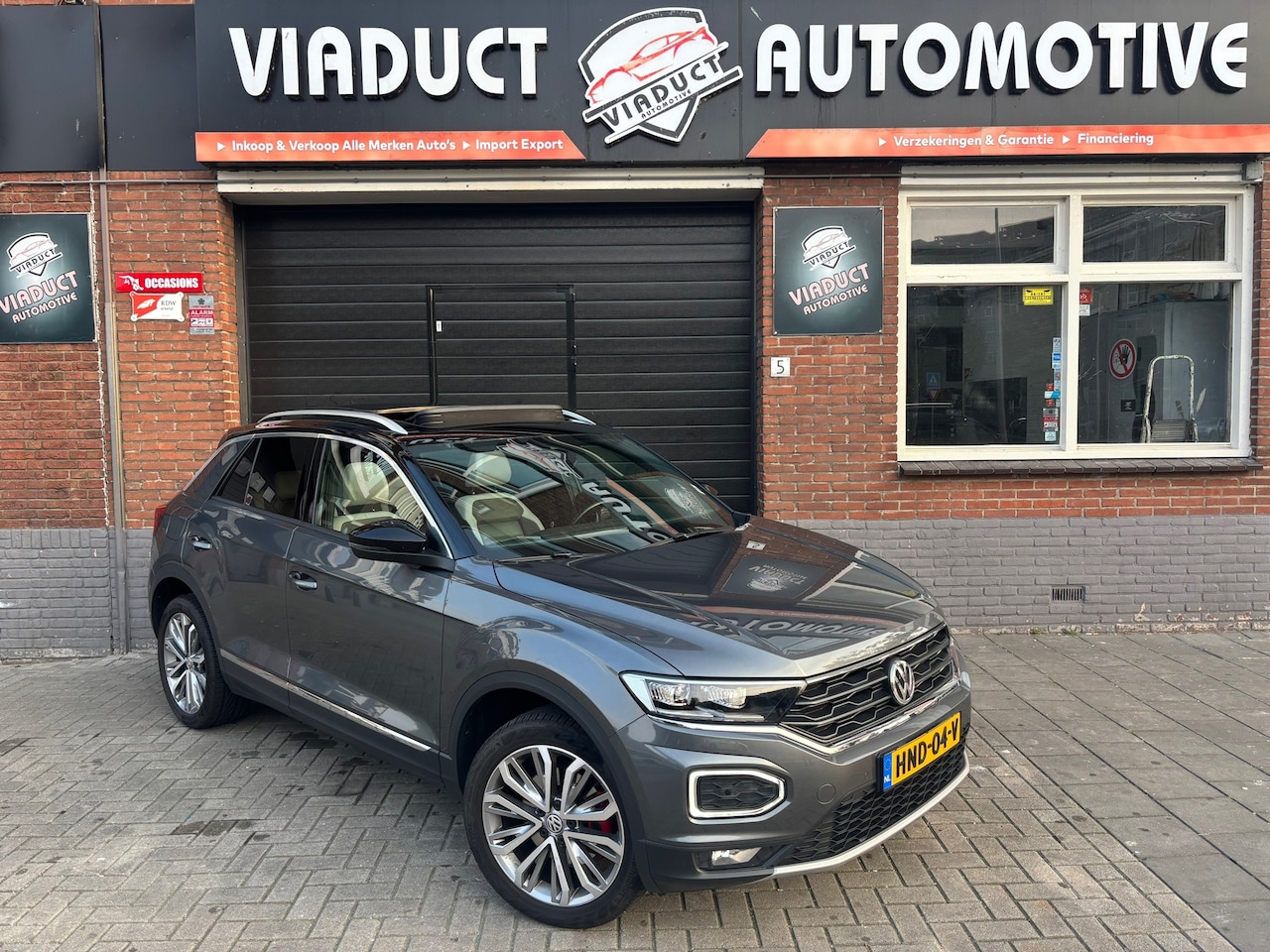 Volkswagen T-Roc - 1.5 TSI Sport Pano leer virtual - AutoWereld.nl