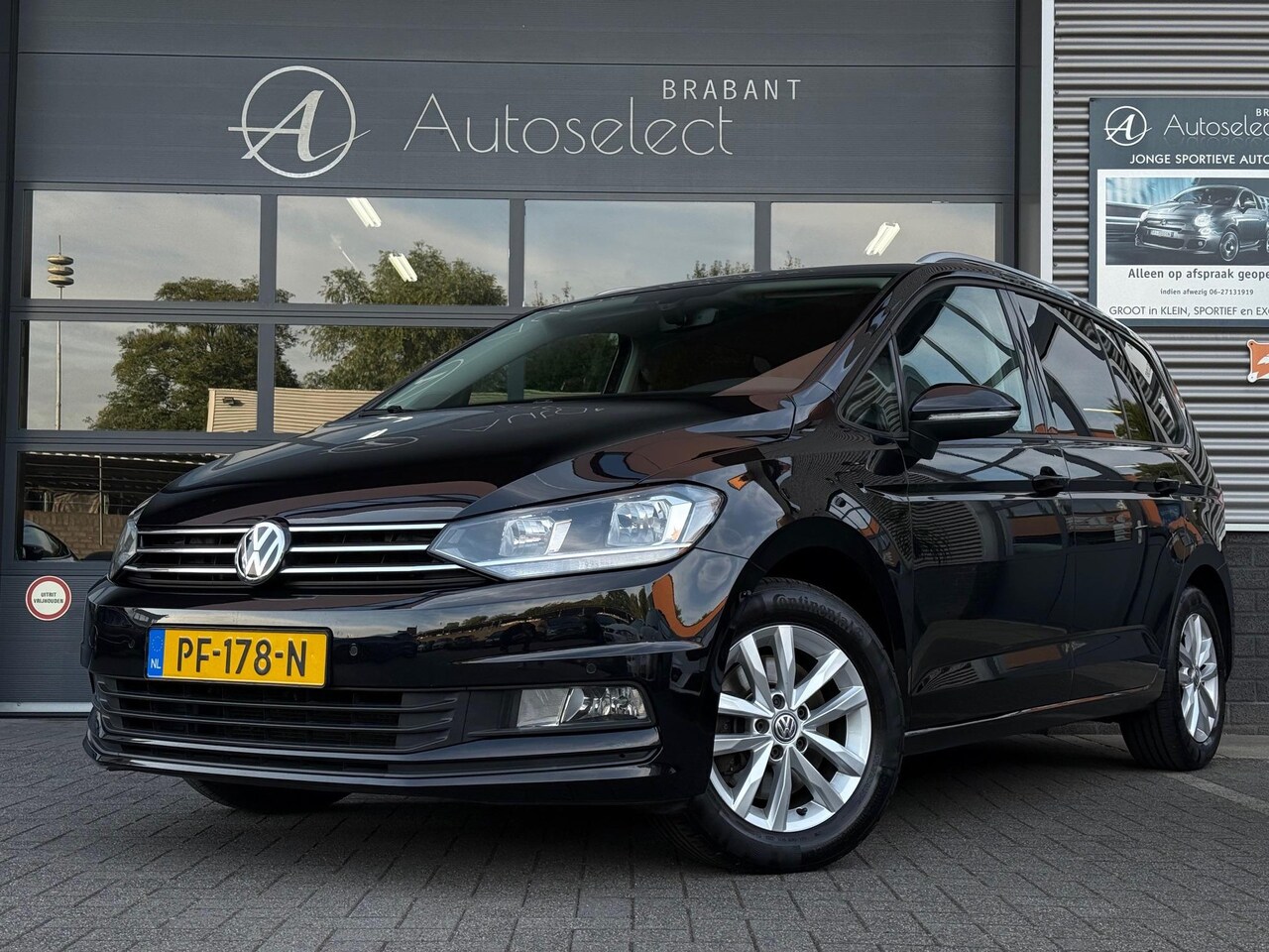 Volkswagen Touran - 1.4 TSI Comfortline Business 7p Cruise CarPlay Camera - AutoWereld.nl