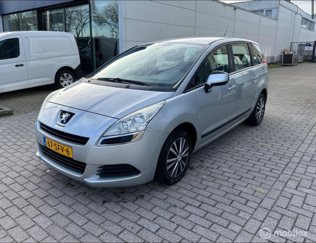 Peugeot 5008 - 1.6 VTi ST Premiere 7p. airco Cruise - AutoWereld.nl