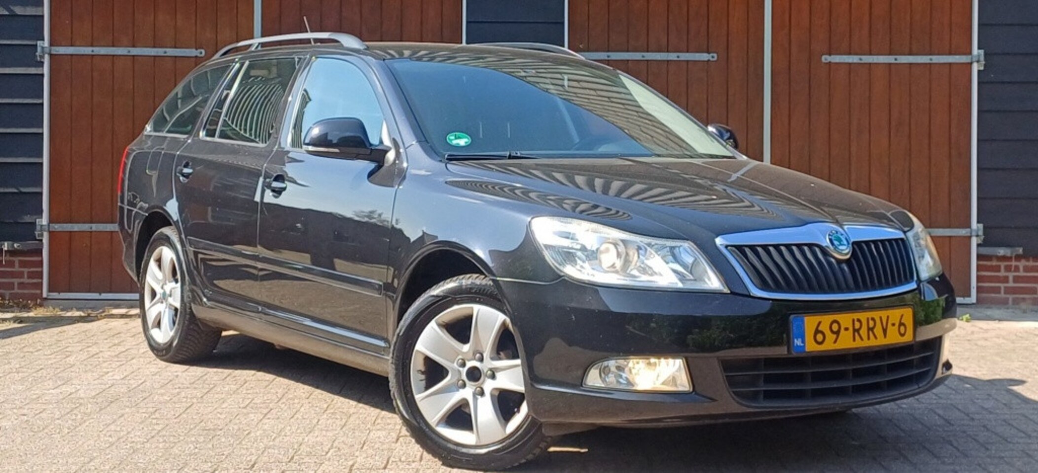 Skoda Octavia Combi - 1.2 TSI Ambition Bns, Trekhaak, NAP, Ruime auto - AutoWereld.nl
